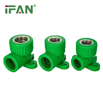 What are the functions of the base at the bottom of a pipe fitting?